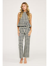 Load image into Gallery viewer, Woman wearing a Navy and white checkered outfit on a white background
