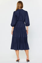 Load image into Gallery viewer, Woman wearing a navy blue midi dress with a belt on a white background
