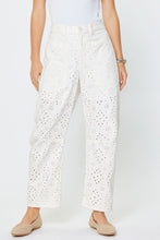 Load image into Gallery viewer, White Barrel Relaxed Fit Pants with subtle embroidered pattern worn by a person on a white background
