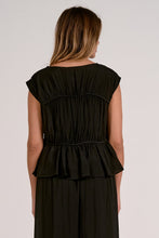 Load image into Gallery viewer, Black tiered top with ruffled layers on a plain background
