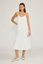 Load image into Gallery viewer, Woman wearing a white slip dress on a plain background
