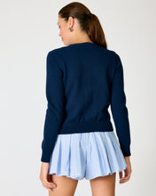 Load image into Gallery viewer, Person wearing a navy sweater and light blue pleated skirt on a white background
