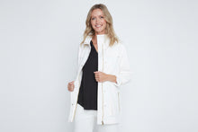 Load image into Gallery viewer, Woman wearing a white jacket over a Black top and white pants on a light gray background

