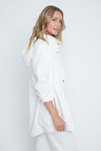 Load image into Gallery viewer, Woman wearing a white shirt with a plain background
