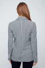 Load image into Gallery viewer, Person wearing a black and white checkered blazer on a light gray background
