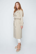Load image into Gallery viewer, Woman wearing a beige trench coat on a white background. One button closure and tie waist.
