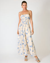 Load image into Gallery viewer, Woman wearing a seashell embroidered  dress with a white background
