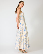 Load image into Gallery viewer, Woman wearing a seashell embroidered  dress with a white background
