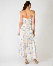 Load image into Gallery viewer, Woman wearing a seashell embroidered  dress with a white background
